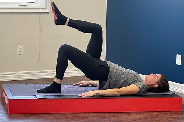Woman doing pilates exercises